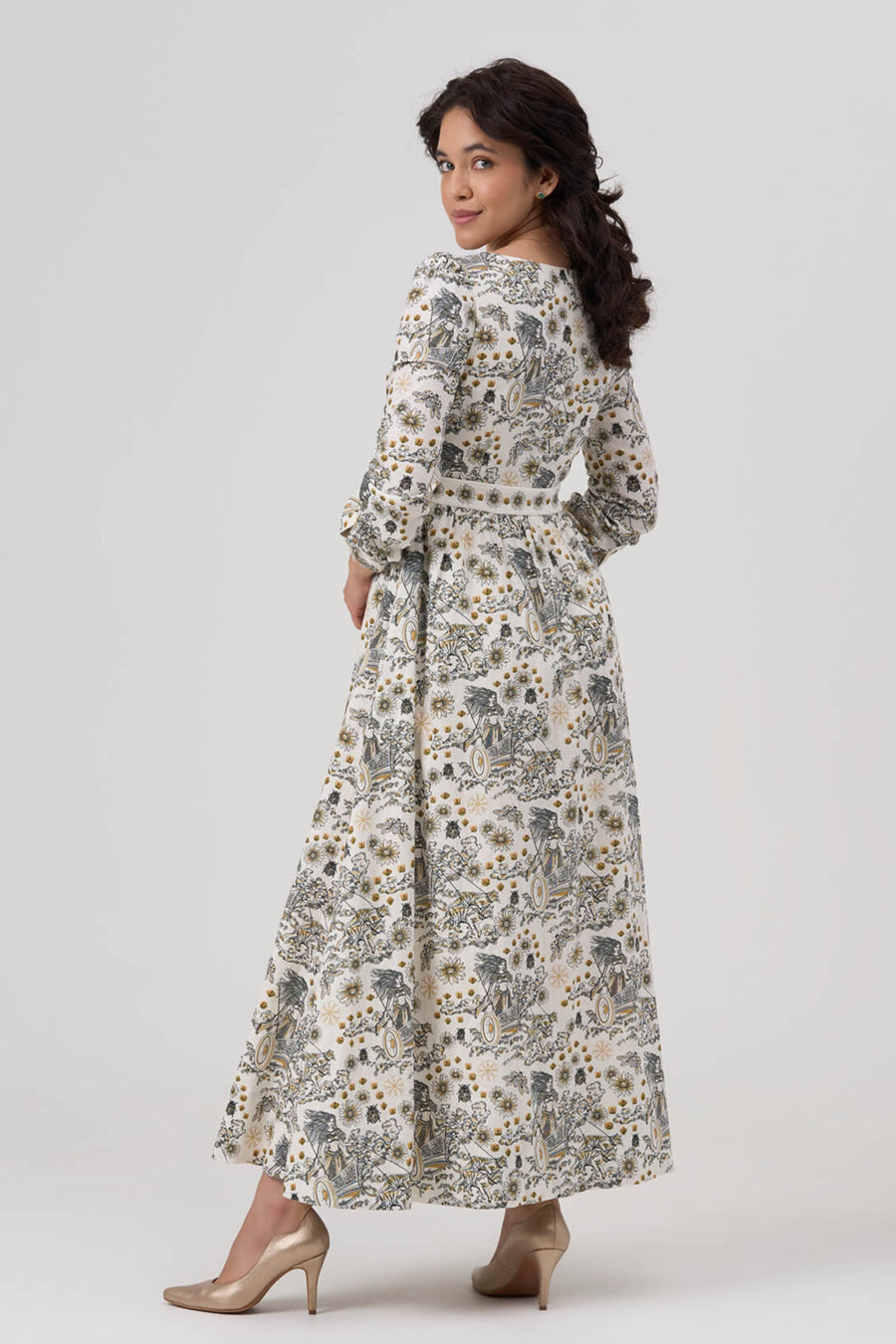 Woman wearing a floral dress on a white background