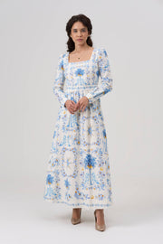 Woman wearing a floral dress with a white background