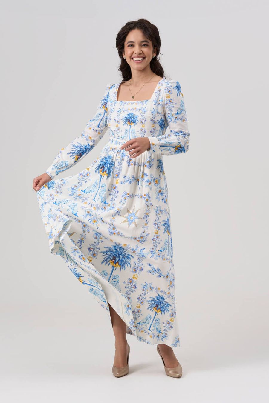 Woman wearing a floral dress on a white background