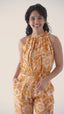 Oshun's Amber Radiance Halter-Neck Linen Jumpsuit with Pockets